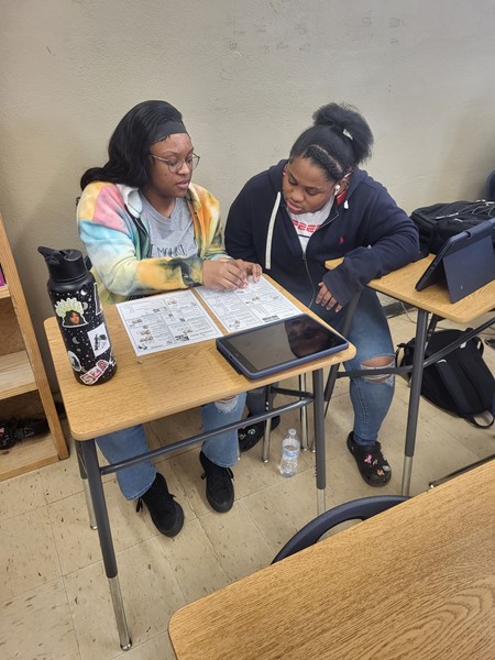 Students in Ms. Green's Economics class played the BEAN GAME today.  They divided into family groups and worked together on trying to live on a "20 Bean Salary", which later was reduced to 13 beans due to a cut in job hours. Managing money means making choices. There is never enough money available for all of the things we’d like to have or do. This game helped them to decide what is important to them. Thank you to Career Coach Deana Reno for your help. 